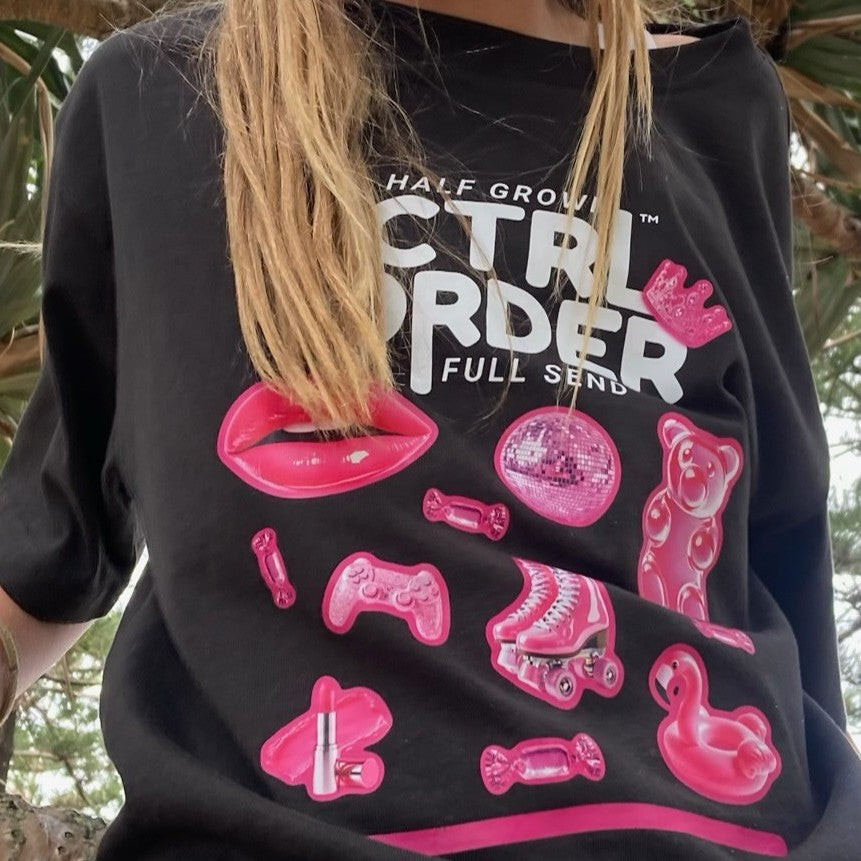 kid climbing tree wearing ctrl-order-neon-pink-edition